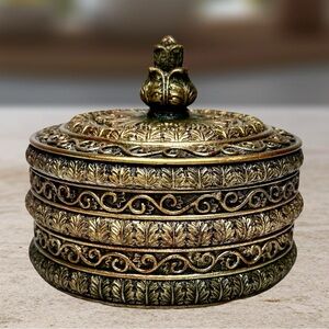 Vintage Ornate Round Metal Trinket Box Lidded Embossed Floral Scrollwork Jewelry